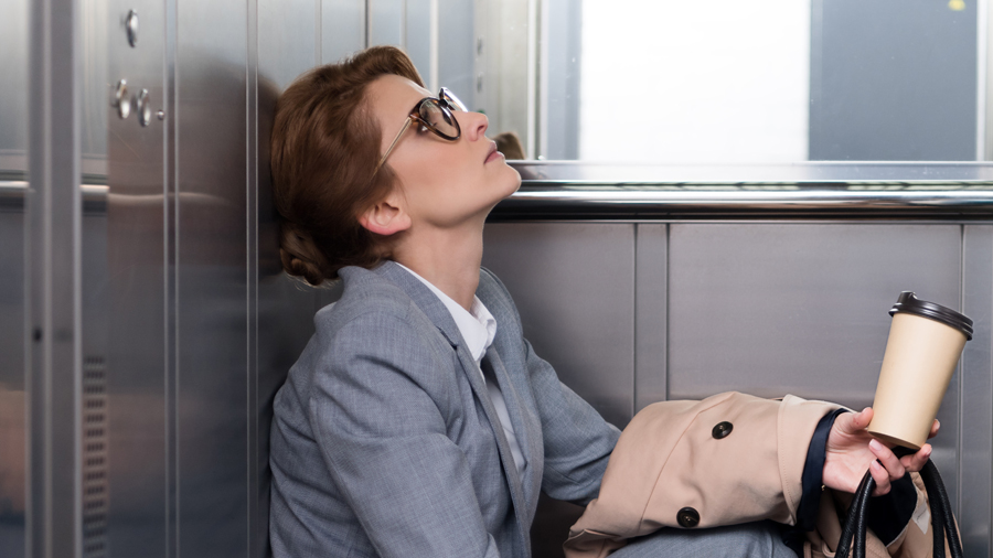 tired_woman_elevator.jpg