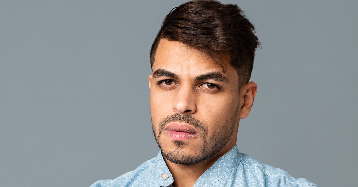 man looking grumpy, what does the Bible say about complaining